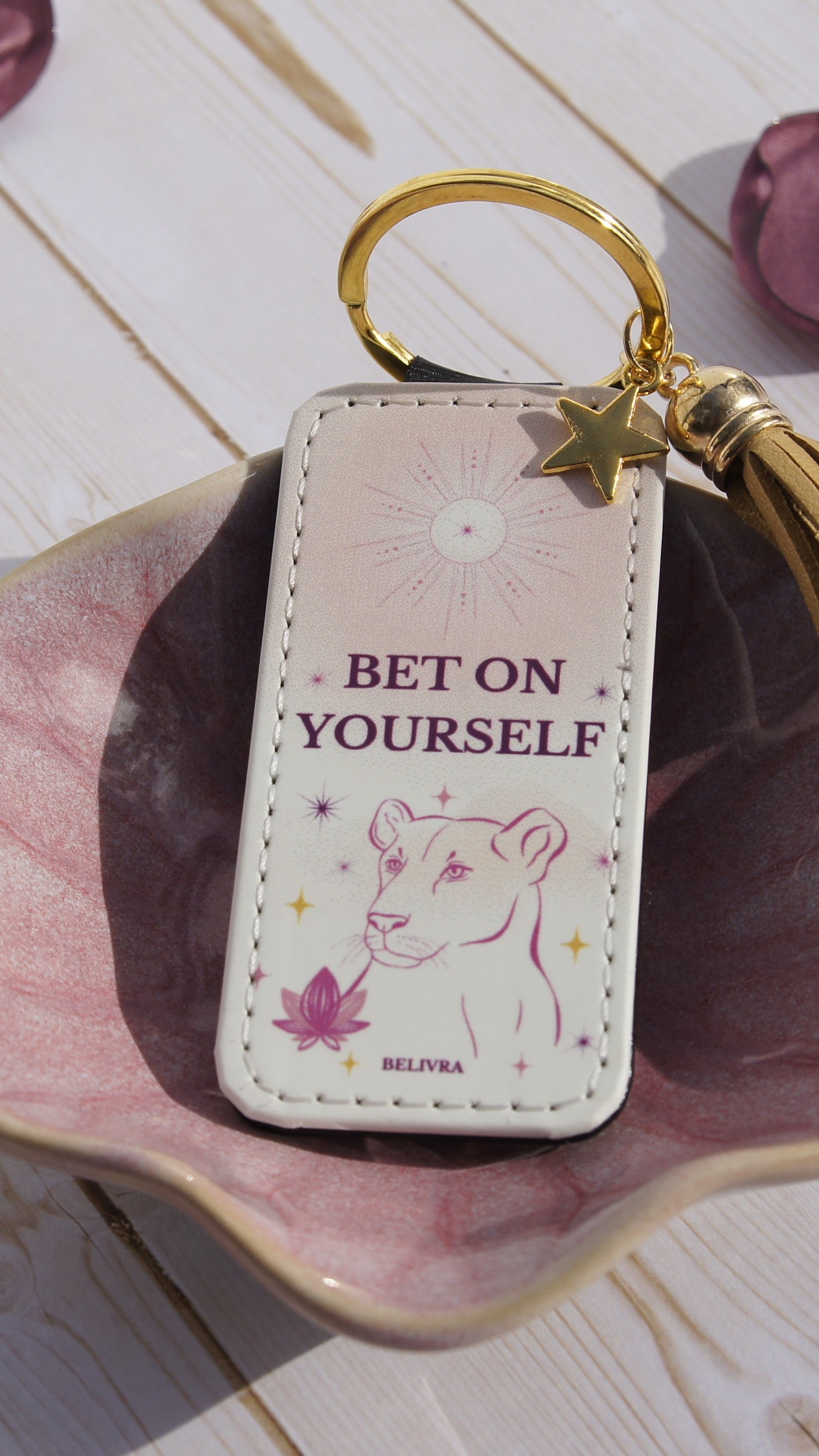 PU leather keychain with “Bet on Yourself” quote, gold star charm, and tassel, symbolizing courage and confidence by Belivra.