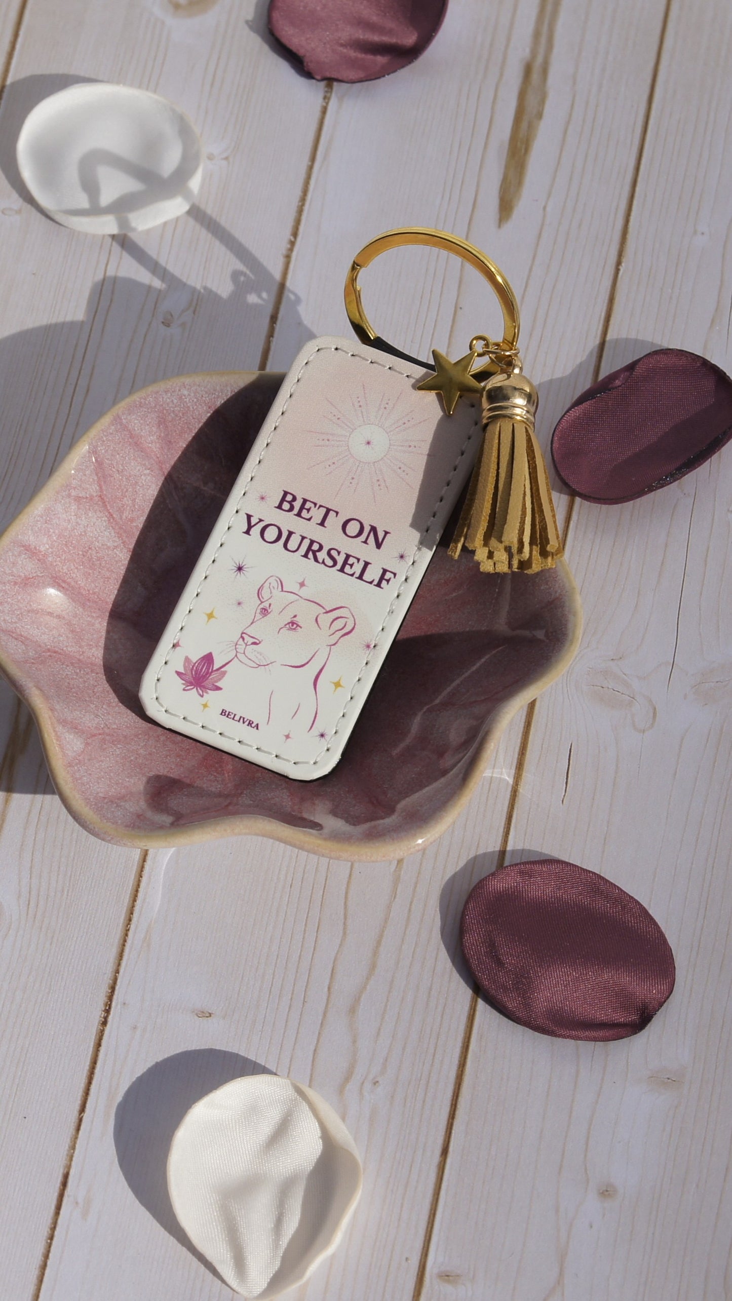 PU leather keychain with “Bet on Yourself” quote, gold star charm, and tassel, symbolizing courage and confidence by Belivra.