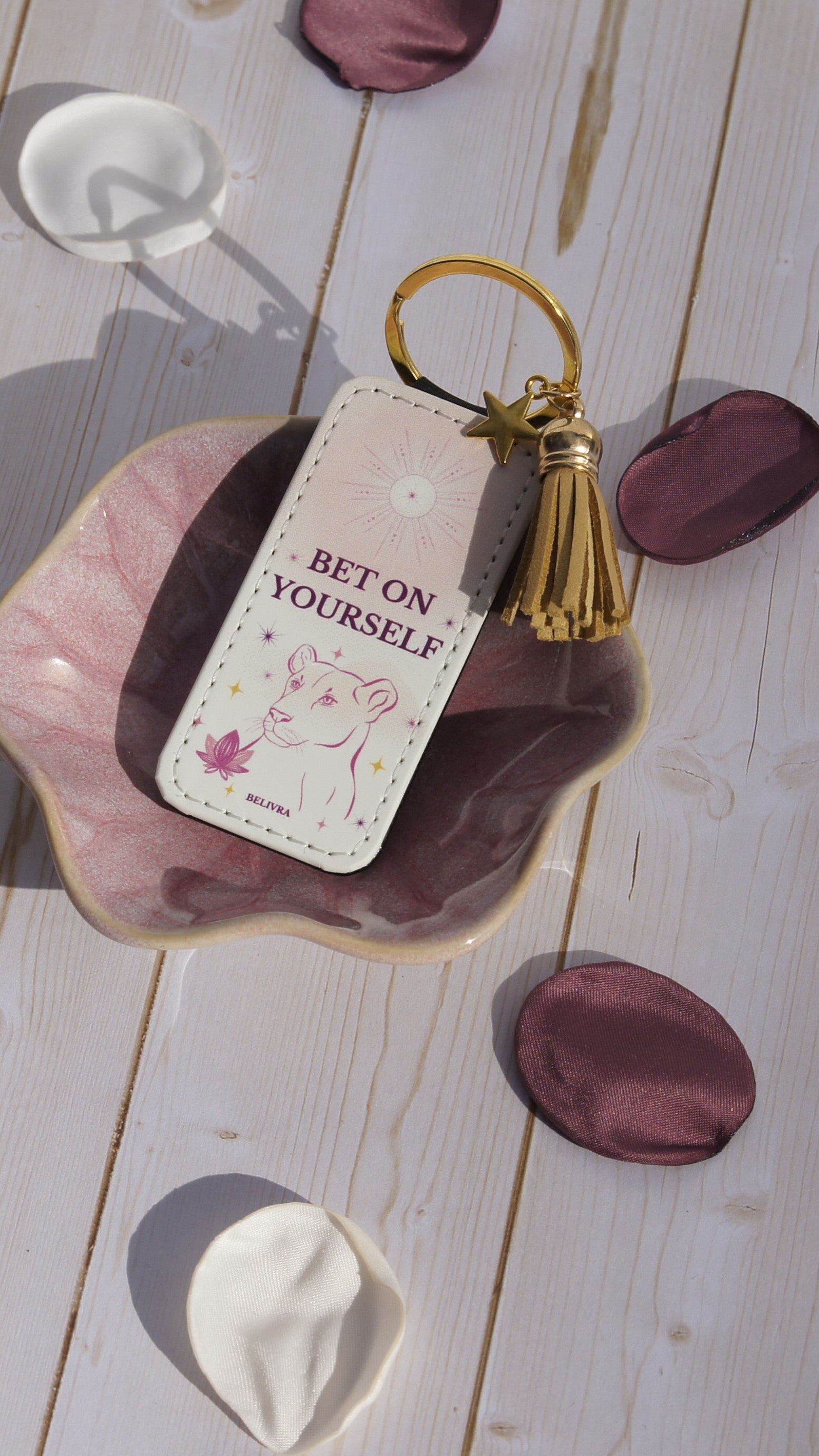 PU leather keychain with “Bet on Yourself” quote, gold star charm, and tassel, symbolizing courage and confidence by Belivra.