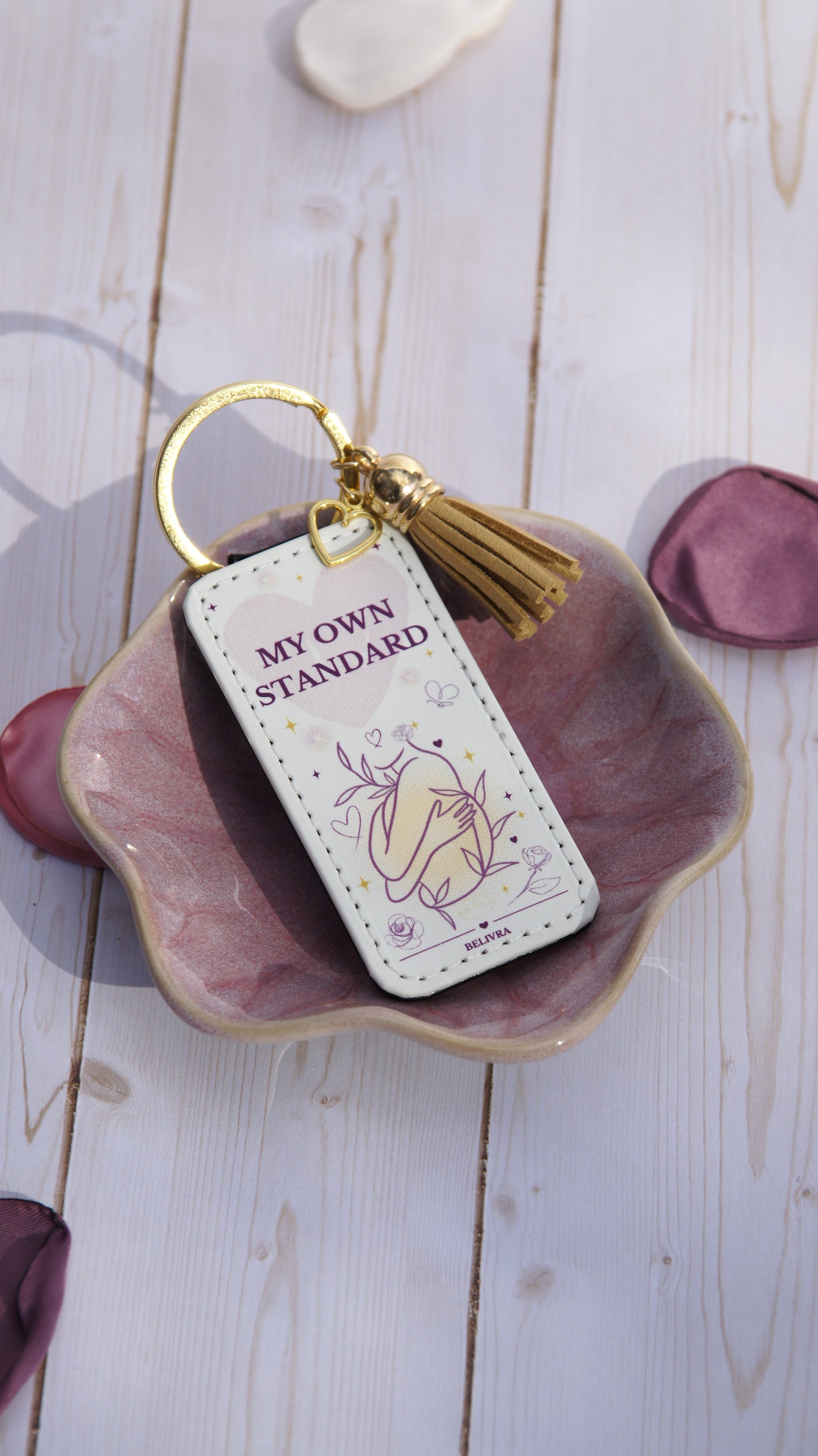 PU leather keychain with “My Own Standard” quote, gold hollow heart charm, and tassel, symbolizing self-love and confidence by Belivra.