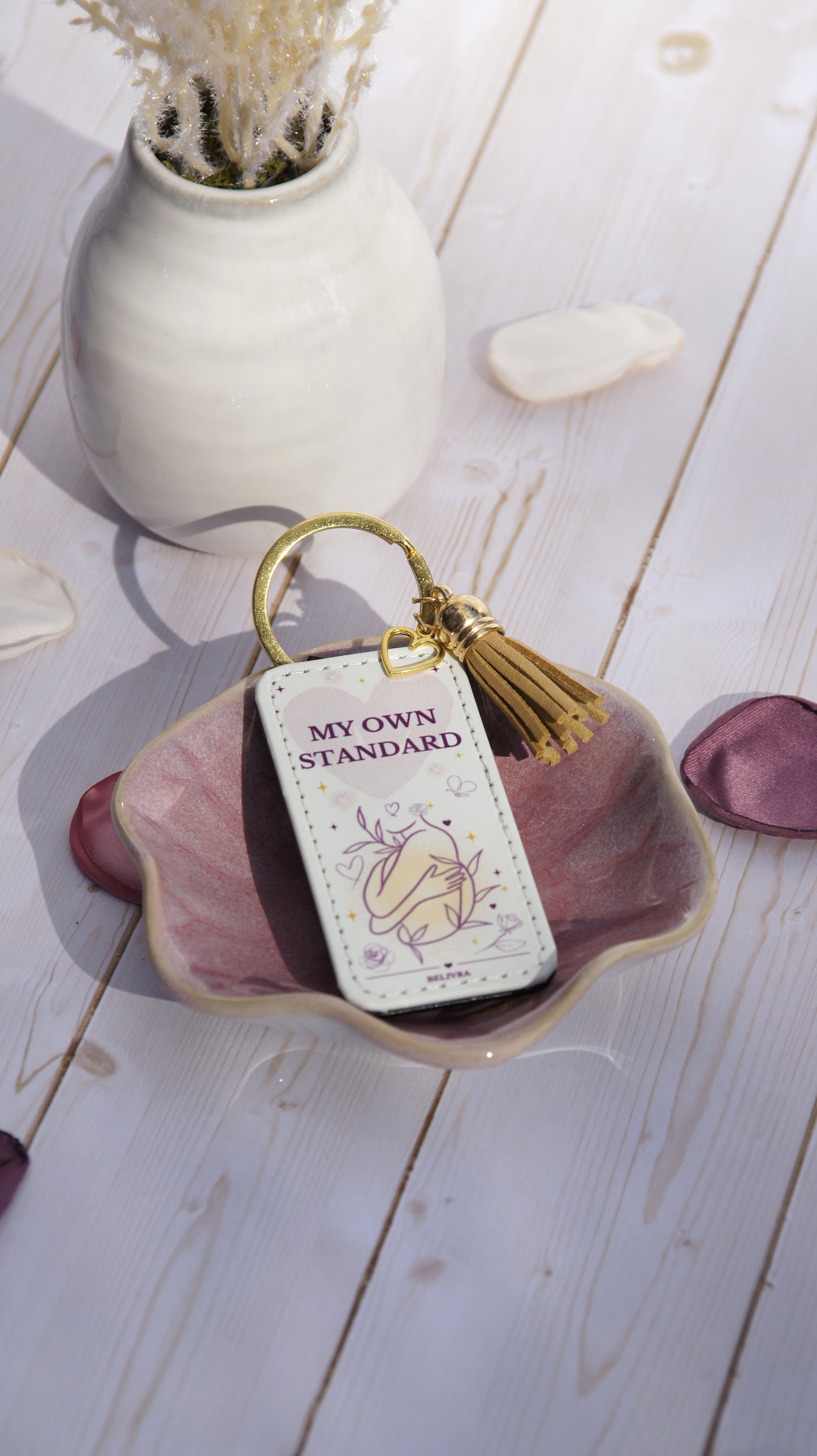 PU leather keychain with “My Own Standard” quote, gold hollow heart charm, and tassel, symbolizing self-love and confidence by Belivra.