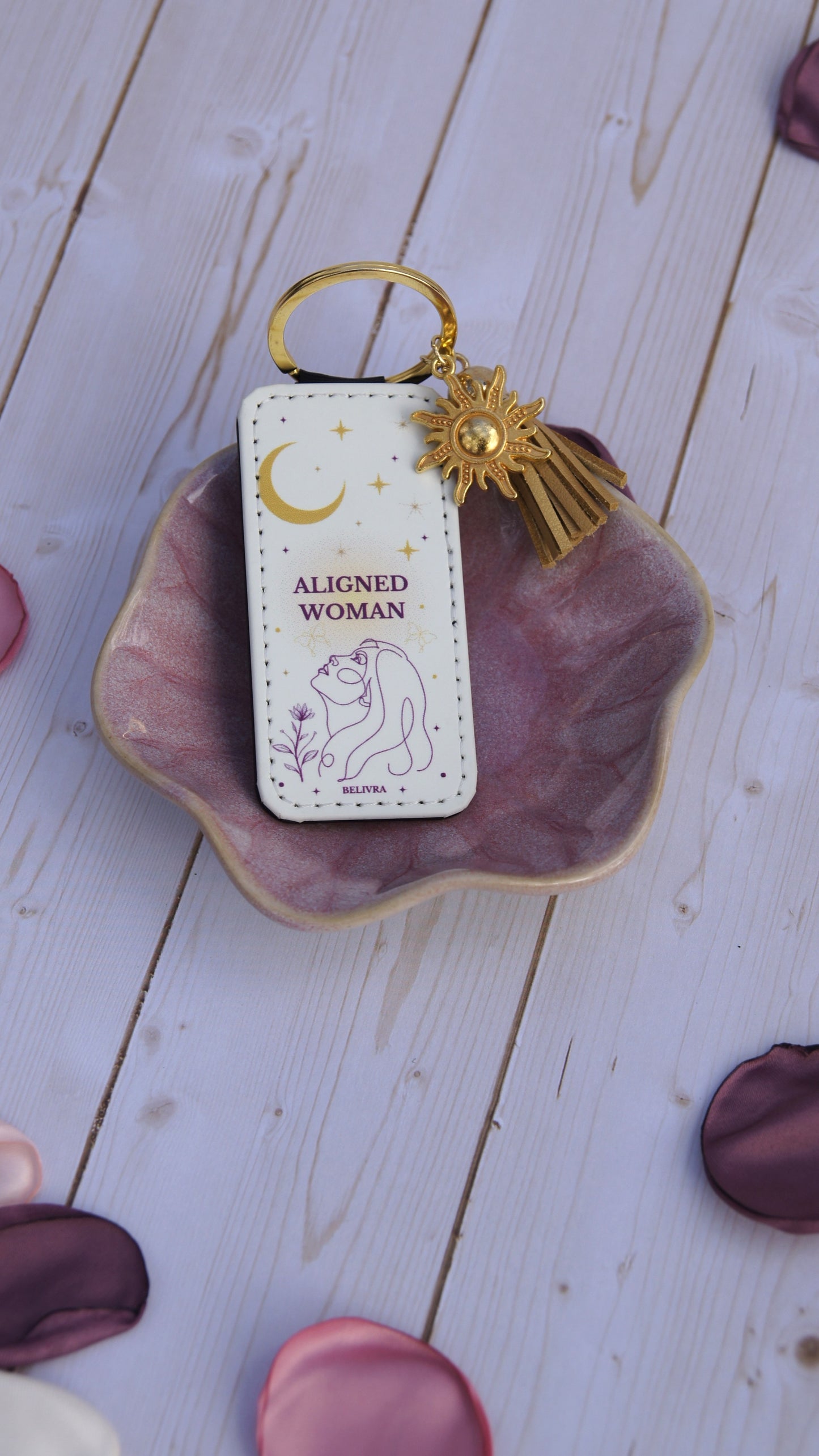 PU leather keychain with “Aligned Woman” quote, gold sun charm, and tassel, symbolizing mindfulness and balance by Belivra.
