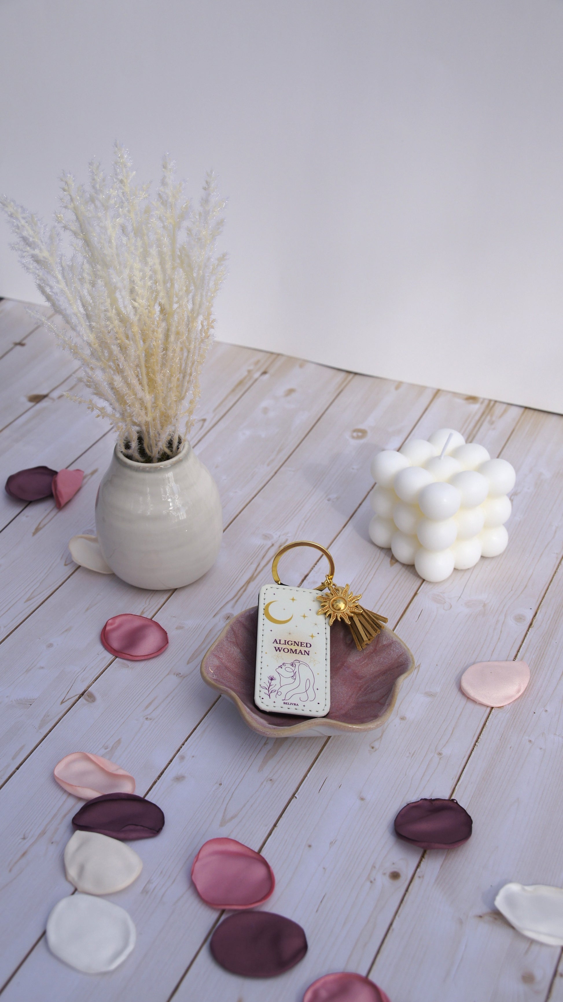 PU leather keychain with “Aligned Woman” quote, gold sun charm, and tassel, symbolizing mindfulness and balance by Belivra.