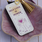 PU leather keychain with “Self-Love Is Power” quote, gold hollow heart charm, and tassel, symbolizing empowerment and confidence by Belivra.