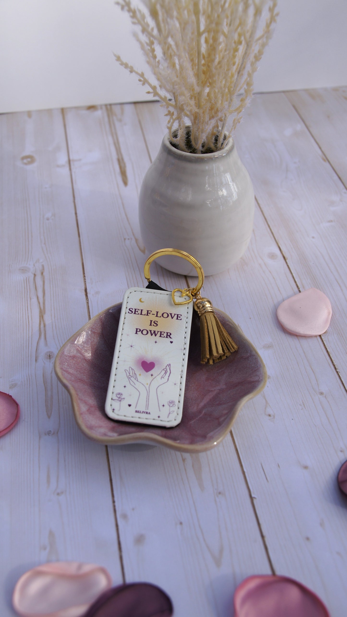 PU leather keychain with “Self-Love Is Power” quote, gold hollow heart charm, and tassel, symbolizing empowerment and confidence by Belivra.