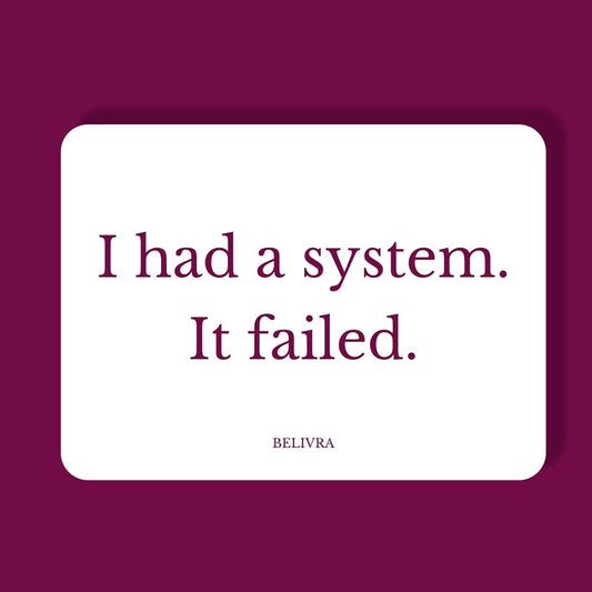 Relatable quote magnet "I had a system. It failed." on neutral card with plum background