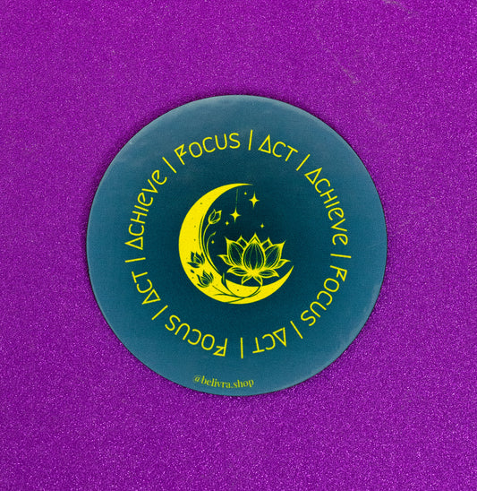 Belivra round motivational magnet with yellow moon and lotus design, featuring the repeated affirmation "Focus | Act | Achieve" in a circular layout. Displayed on a sparkly purple background – perfect for inspirational fridge decor, vision boards, or office motivation for ambitious women and creatives.