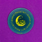Belivra round motivational magnet with yellow moon and lotus design, featuring the repeated affirmation "Focus | Act | Achieve" in a circular layout. Displayed on a sparkly purple background – perfect for inspirational fridge decor, vision boards, or office motivation for ambitious women and creatives.