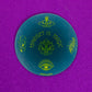 Belivra round motivational magnet with the affirmation "Mindset Is Magic" in bold yellow text – features mystical symbols including crystals, a lotus flower, moth, feather, and all-seeing eye on a deep blue background. Displayed on a sparkly purple surface, perfect for spiritual desk decor, fridge inspiration, or manifestation mindset tools.