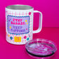 Belivra stainless steel tumbler mug with the quote "Stay Badass. Keep Sipping." in bold lettering – shown without the lid to highlight its insulated interior. Features a vibrant pink grid design with playful doodles like flowers, diamonds, and stars. Comes with a clear spill-resistant lid, perfect for hot or cold drinks, desk vibes, and empowering sips on the go.