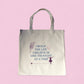 Cream-colored tote bag with the quote “I Build the Life I Believe In, One Thought at a Time” in teal and plum text, symbolizing mindfulness and intentional living.