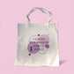 Cream polyester tote bag with “I Cheer for Women Who Go For It” quote in purple, symbolizing sisterhood and empowerment by Belivra.