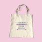 Eco-friendly cream tote bag with the quote “I Choose Alignment Over Hustle” printed in rose and plum text, symbolizing balance and mindful living.