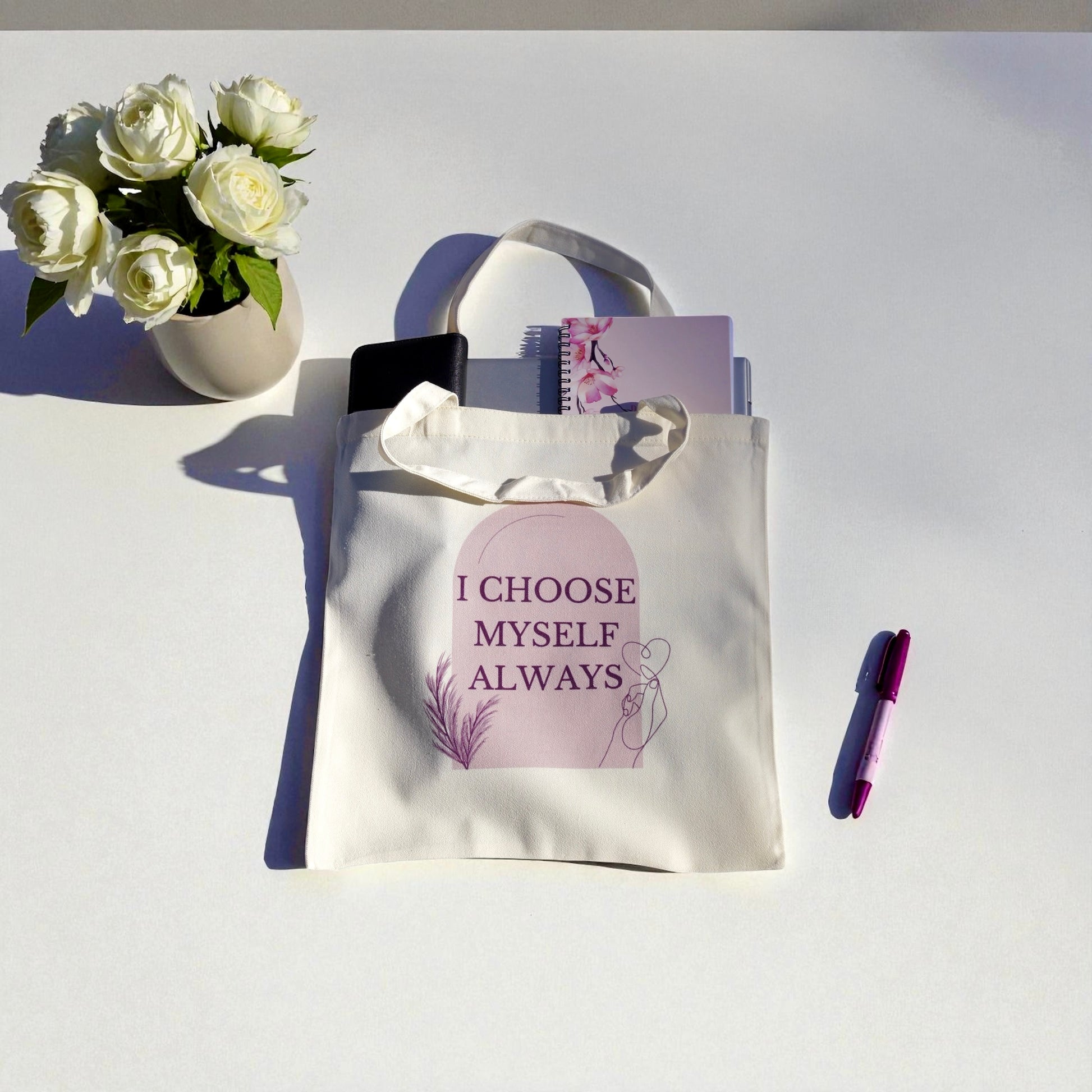 Cream tote bag with the quote “I Choose Myself Always” in soft plum and blush tones, featuring feminine line art symbolizing self-love and empowerment.