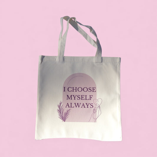 Cream tote bag with the quote “I Choose Myself Always” in soft plum and blush tones, featuring feminine line art symbolizing self-love and empowerment.